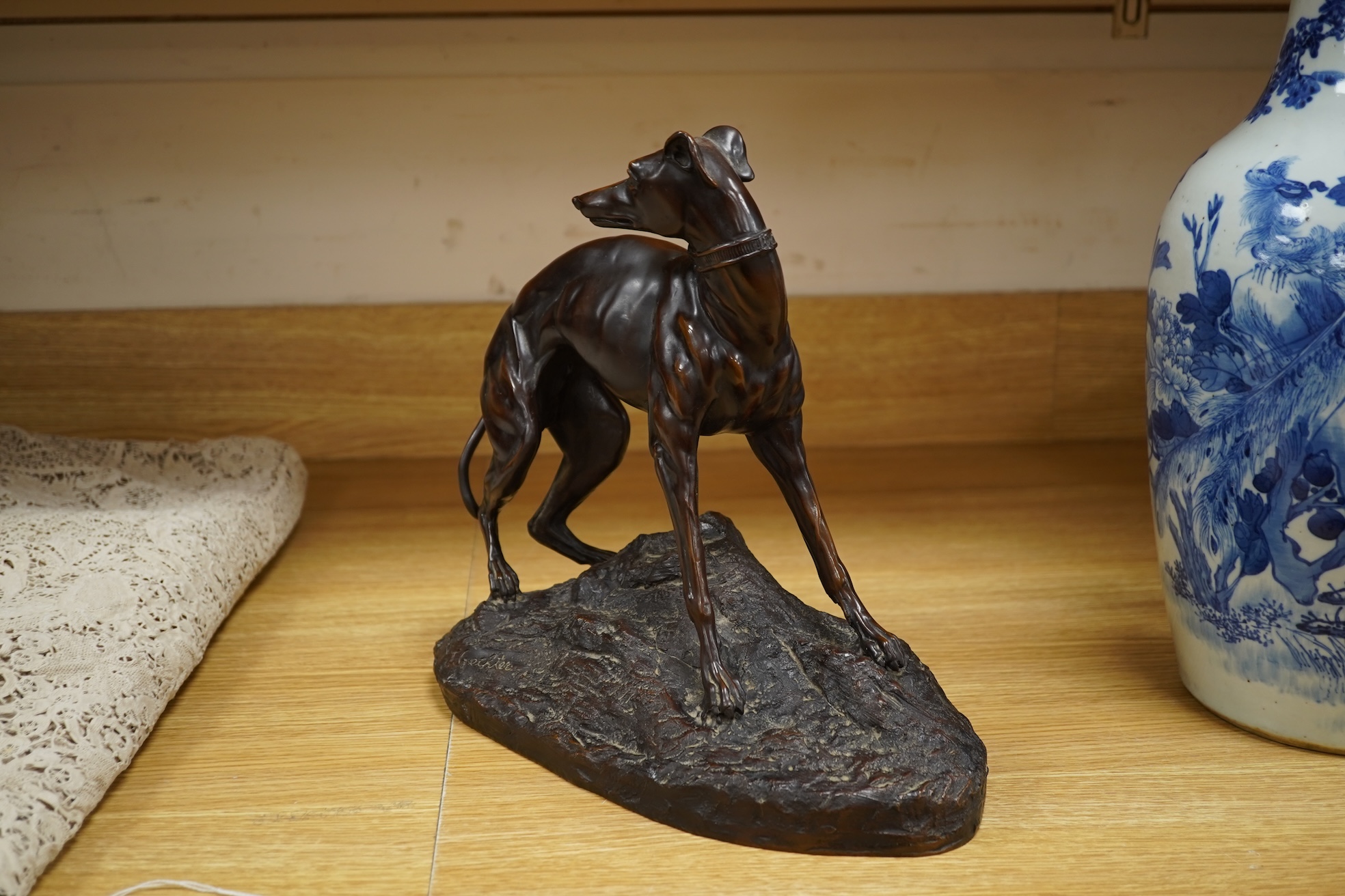 After Theodore Gechter, a model of bronze greyhound, 32cm wide x 29.5cm high